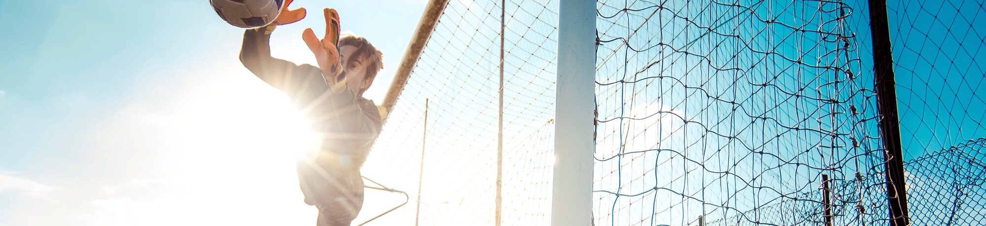 Soccer player in action on the soccer stadium